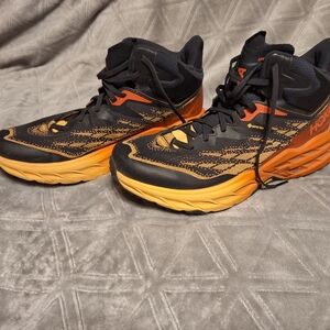 8.5 Hoka Men's Black and Orange Speedgoat 5 High Top Athletic Shoes